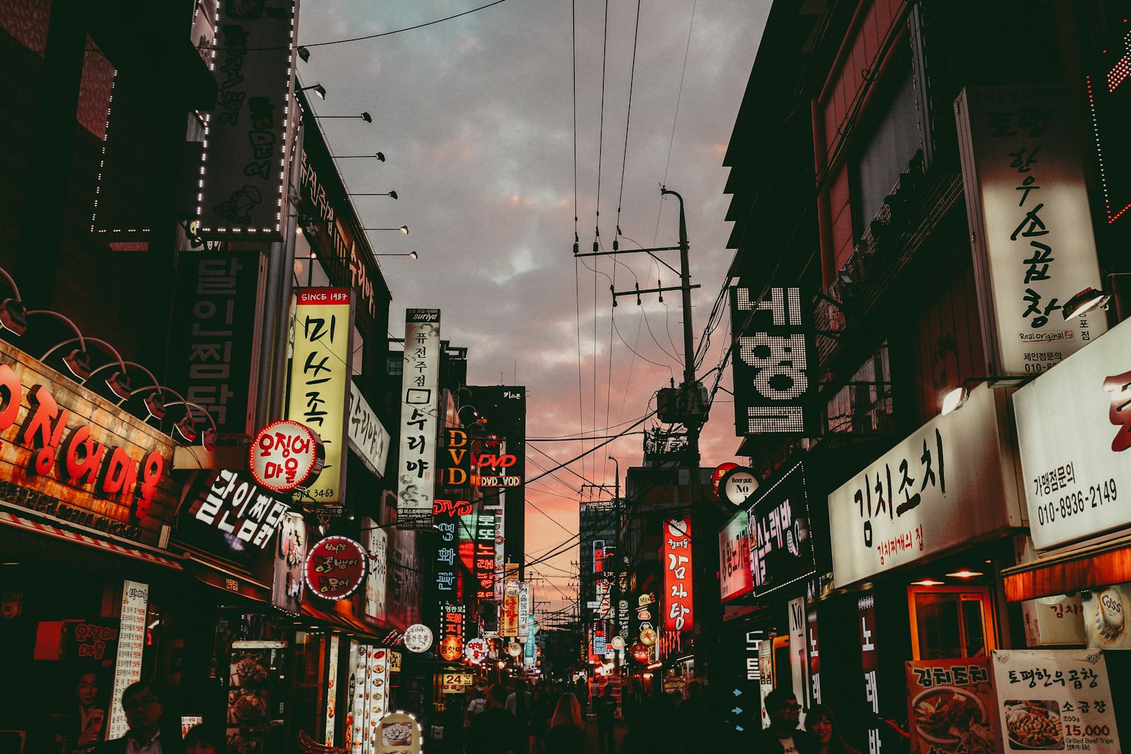 Sign-lit commercial street in Seoul